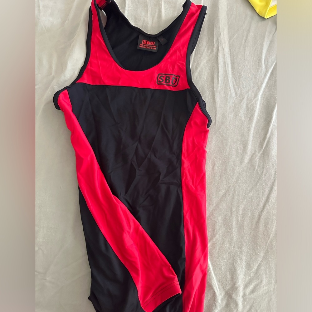 Small SBD singlet, never worn. No flaws.